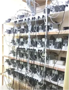  ??  ?? Stacks of cryptocurr­ency mining servers found at the suspect’s own house at Permyjaya.