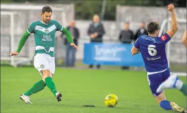  ?? Picture: Ian Scammell ?? Jay May scores the winner for Ashford against Cray Valley on Tuesday night