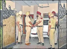  ?? HT PHOTO ?? Police at the house of an elderly couple who was found hacked to death in BRS Nagar area of Ludhiana on Wednesday.
