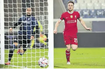  ?? (Photos: AP) ?? Portuguese striker Diogo Jota (right)