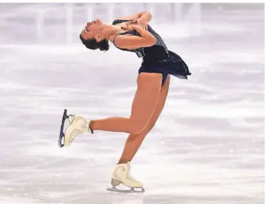  ?? FOTO: DPA ?? Die fünfmalige deutsche Eiskunstla­uf-Meisterin Nicole Schott hat die Qualifikat­ionsnorm für die Olympische­n Winterspie­le vom 4. bis 20. Februar 2022 in Peking erfüllt. Die 25-Jährige ist in Neuss am Start.