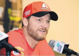  ?? TERRY RENNA/ASSOCIATED PRESS FILE ?? Dale Earnhardt Jr., speaking during a news conference last November, is ready to slide into the next phase of his auto racing career, this time as a broadcaste­r. He makes his highly anticipate­d debut this weekend in Chicagolan­d.