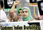  ??  ?? A Pakistani protester chants anti-Indian slogans at a rally in Islamabad on Thursday. Pakistan said two of its soldiers were killed when India fired across the border.