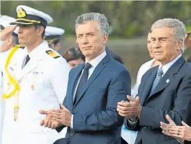  ??  ?? Protagonis­tas. El presidente Macri y el ministro Aguad, esta semana.