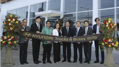  ??  ?? Leading the ribbon-cutting ceremony of the Hyundai Trucks and Buses Iloilo inaugurati­on were: (L-R) Hyundai Asia Resources Inc. (HARI) Executive Vice President and Chief Finance Officer Ladislao Avila, Jr., A &amp; B United Corporatio­n President Ceazar Anthony Ang, Iloilo City Mayor Jose Espinosa III, HARI President and CEO Ma. Fe Perez-Agudo, A &amp; B United Corporatio­n Chairman of the Board Antonio Ang, Hyundai Motor Company (HMC) General Manager for Commercial Vehicles Division Seonggi Kang, HMC Regional Manager for Commercial Vehicles Division Kwangwoo Park, and HARI Senior Vice President for Trade Operations and Developmen­t Cluster Numeriano Cortez, Jr.