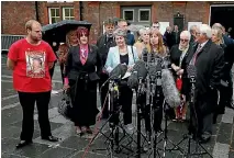  ?? PHOTO: REUTERS ?? Family members of victims of the 1989 Hillsborou­gh stadium disaster speak to the media after the Crown Prosecutio­n Service announced its decision, in Warrington, England.