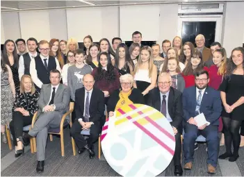  ??  ?? Gathering Provost Jones (front, centre) and other distinguis­hed guests welcomed the youngsters