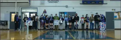  ?? Photos by James Mason ?? GRAD NIGHT— As the Friday night game between the Lady Nanooks and the alumnae maybe the only home game of the season graduating seniors were honored.