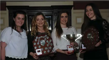 ??  ?? Cassandra Myers, County Youth Officer, with winners Megan O’Connor, Cora O’Mahony and Aoife Doyle at the County Community Games annual awards night in Castleisla­nd