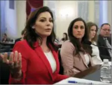  ?? MANUEL BALCE CENETA — THE ASSOCIATED PRESS ?? From left, Olympic bronze medal gymnast Jamie Dantzscher, Olympic gold medal gymnast Jordyn Wieber, speed skater Bridie Farrell and figure skater Craig Maurizi testify about the U.S. Olympic Committee’s handling of sex-abuse complaints on Capitol Hill...