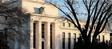  ?? Down. — Reuters ?? Precaution­ary measures: The Fed building in Washington. Chairman Powell openly admitted this week that the pain may be inevitable as the central bank gets inflation back