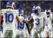  ?? RALPH FRESO - THE ASSOCIATED PRESS ?? Los Angeles Rams wide receiver Cooper Kupp (10) celebrates his touchdown catch against the Arizona Cardinals with wide receiver Odell Beckham Jr. (3) during the second half of an NFL football game Monday, Dec. 13, 2021, in Glendale, Ariz.