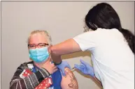  ?? Sharon Hospital / Contribute­d photo ?? A Sharon Hospital staff member receives the COVID-19 vaccine.