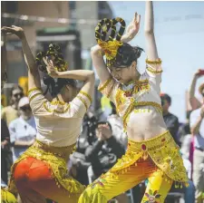  ?? ASHLEY FRASER ?? The 2023 Ottawa Chinatown Night Market unfolded Sunday on Somerset Street, where dancing performers dazzled the crowd.