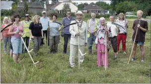  ??  ?? n ‘FANTASTIC’: (Clockwise from above) Mayor and mayoress George and Judith Cooper join in the festival; Friends member Barry Ratcliffe; enjoying a picnic in the sun; scything action