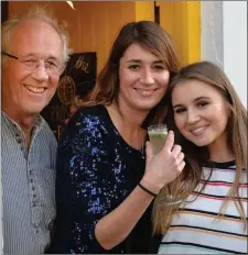  ?? Matthisa Jauch with his daughters, Dara and Eadaoin who were serving bubbly at Bawn’s. ??