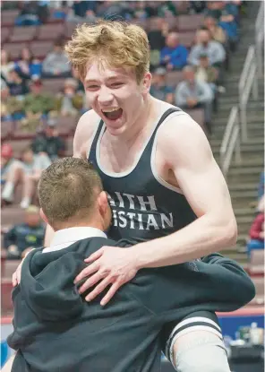  ?? DAVID GARRETT/SPECIAL TO THE MORNING CALL PHOTOS ?? Faith Christian’s Adam Waters beat Northweste­rn Lehigh’s Luke Fugazzotto on Saturday in the 172-pound, 2A state championsh­ip match at Giant Center in Hershey.