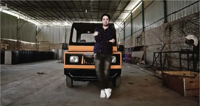  ??  ?? CAIRO: In this Aug 1, 2017 photo, Egyptian entreprene­ur Ahmed Saeed El-Feki, who hopes to reshape the country’s auto-mobile industry with his new minicar, poses for a photograph inside a workshop in the village of Kerdasa, not far from the Giza...