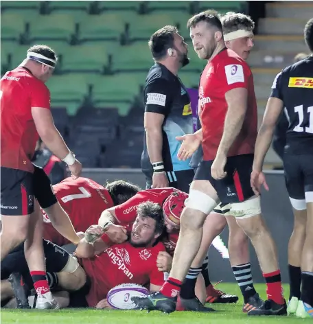  ??  ?? Touchdown: Sean Reidy grounds the ball for one of his two tries and (left) Jordi Murphy