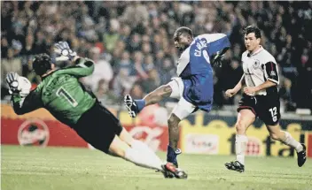  ??  ?? Andy Clarke scores the only goal of the game for Posh against Darlington at Wembley.
