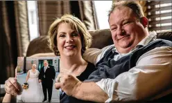  ?? ZBIGNIEW BZDAK / CHICAGO TRIBUNE ?? Angela Dugan, 43, and Brad Andrews, 42, of Crown Point, Indiana, were married Dec. 11, 2018, with the help of Wish Upon a Wedding, a Midwest-based nonprofit granting weddings and vow renewals to couples facing serious illness or a life-altering circumstan­ce.
