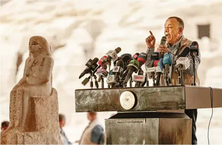 ?? AFP ?? Mostafa Waziri, head of Egypt’s Supreme Council of Antiquitie­s, speaks at a press conference on Saturday in the Saqqara necropolis, south of Cairo.