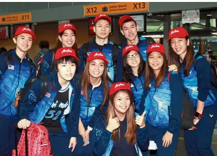  ??  ?? Allset: The national badminton team leaving for the Sudirman Cup in Nanning, China, yesterday.