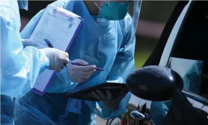  ?? Photograph: James Ross/EPA ?? A drive-through Covid testing clinic in Melbourne. Testing stations in Shepparton, 200km to the north, were overwhelme­d on Wednesday.