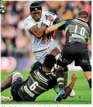  ??  ?? Clash: Lawes tries to bring Itoje down INPHO