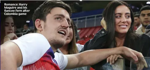  ??  ?? Romance: Harry Maguire and his fiancee Fern after Colombia game