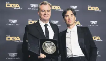  ?? ?? Director Christophe­r Nolan poses with the nominee plaque with actor Cillian Murphy at the 76th Annual Directors Guild of America Awards, Beverly Hills, California, U.S., Feb. 10, 2024.