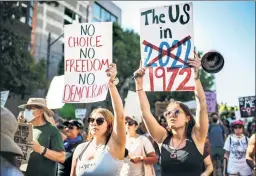  ?? ?? Midterm madness: Protesters march after the Supreme Court’s 2022 Dobbs decision — just the scene Democrats want to set in 2024.