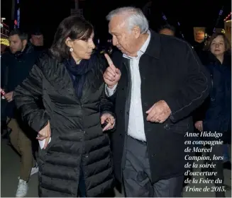  ??  ?? Anne Hidalgo en compagnie de Marcel Campion, lors de la soirée d’ouverture de la Foire du Trône de 2015.