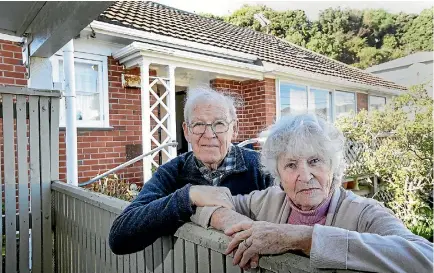  ?? PHOTO: KEVIN STENT/FAIRFAX NZ ?? Patricia and Pat O’Neill say their Housing New Zealand home in Wellington is surrounded by sewage during heavy rain.