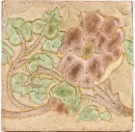  ?? SOULIS AUCTIONS ?? Fresh flowers fade quickly. Art pottery tiles, like this one by Wheatley, are made to last.