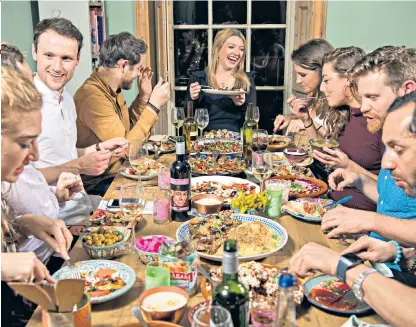  ??  ?? Don’t stand on ceremony: Lucy Holden hosted an informal dinner party for her friends using recipes from Tony Kitous’s new book