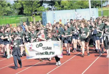  ??  ?? Team Hyndburn at the 2015 opening ceremony of the SPAR games