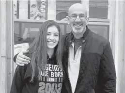  ??  ?? On the left, Howie and his daughter, Jocelyn, in one of the main squares they encountere­d while traveling in Budapest. Howie’s sons, Noah and Justin, right, wearing their MSDStrong and Douglas Strong T-Shirts, on their way to the March for Our Lives event March 24 in Parkland.