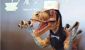  ?? SHIZUO KAMBAYASHI/AP ?? In 2015, Japan’s Henn na Hotel claimed to be the first of its kind to welcome an artificial intelligen­ce staff, with guests greeted by robotic dinosaurs as front-desk assistants.