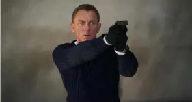  ?? Nicola Dove ?? Daniel Craig stars as James Bond in “No Time to Die,” a film produced by MGM and Eon Production­s that is now owned by Amazon.