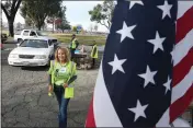  ?? Nity facilities and neighborCH­RIS RILEY/TIMES-HERALD hoods in Solano County. ?? Elizabeth Hoffman is a driving force behind Rebuilding Together Solano County, which gave out free food and supplies to veterans on Veterans Day in Vallejo.