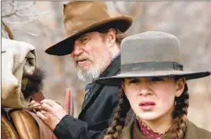  ?? Lorey Sebastian Paramount Pictures ?? JEFF BRIDGES’ Rooster Cogburn helps a grieving young woman (Hailee Steinfeld) track down her father’s killer in 2010’s “True Grit.”