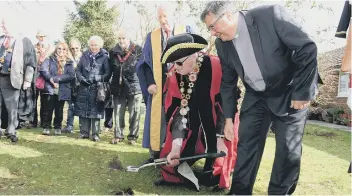  ?? PHOTOS: KATE SHEMILT ?? Bill Craven, the Downtown mayor, and the Rev Mark Payne digging the first sod for the new Almshouses in St Pancras
