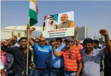  ??  ?? Indian citizens welcome Narendra Modi to Dubai during the Indian PM’s visit to the UAE in 2015