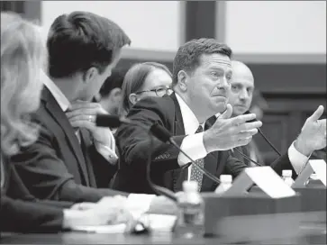  ?? Jacquelyn Martin Associated Press ?? JAY CLAYTON, chairman of the Securities and Exchange Commission, gestures as he testifies during a House Financial Services Committee hearing in September in Washington.