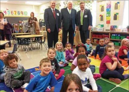  ?? EVAN BRANDT — DIGITAL FIRST MEDIA ?? From left, State Rep. Tom Quigley, state Rep. Tim Hennessey and Jim Phelps from the Pennsylvan­ia Early Learning Investment Commission, visited Lauren Emes’ Pre-K classroom at Franklin Elementary School Tuesday. The classroom was funded by expanded...