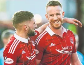  ?? Photograph: SNS ?? Adam Rooney is all smiles at full time yesterday