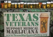  ?? RALPH BARRERA / AMERICAN-STATESMAN ?? Petitions signed by 1,413 veterans in support of medical marijuana for post-traumatic stress disorder and other service-related conditions were delivered to Gov. Greg Abbott in February.