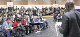  ?? ALIE SKOWRONSKI askowronsk­i@miamiheral­d.com ?? Community members listen to a presentati­on during a town hall discussing the potentials for county-owned land known as the Poinciana Industrial Park on Feb. 6.