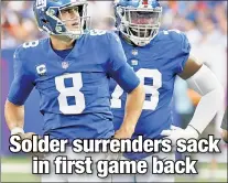  ?? N.Y. Post: Charles Wenzelberg ?? GOT THE BLUES: Daniel Jones (left) was sacked twice Sunday, while Andrew Thomas and the offensive line couldn’t help the running game.